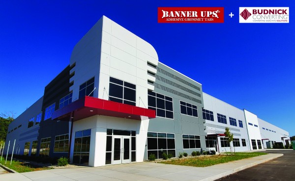Budnick Converting headquarters building with Banner Ups and Budnick logos