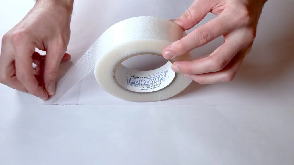Step 2 — Tape the edge with hem tape