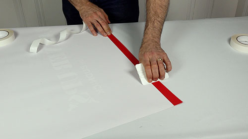 Step 3: Fold the banner hem
