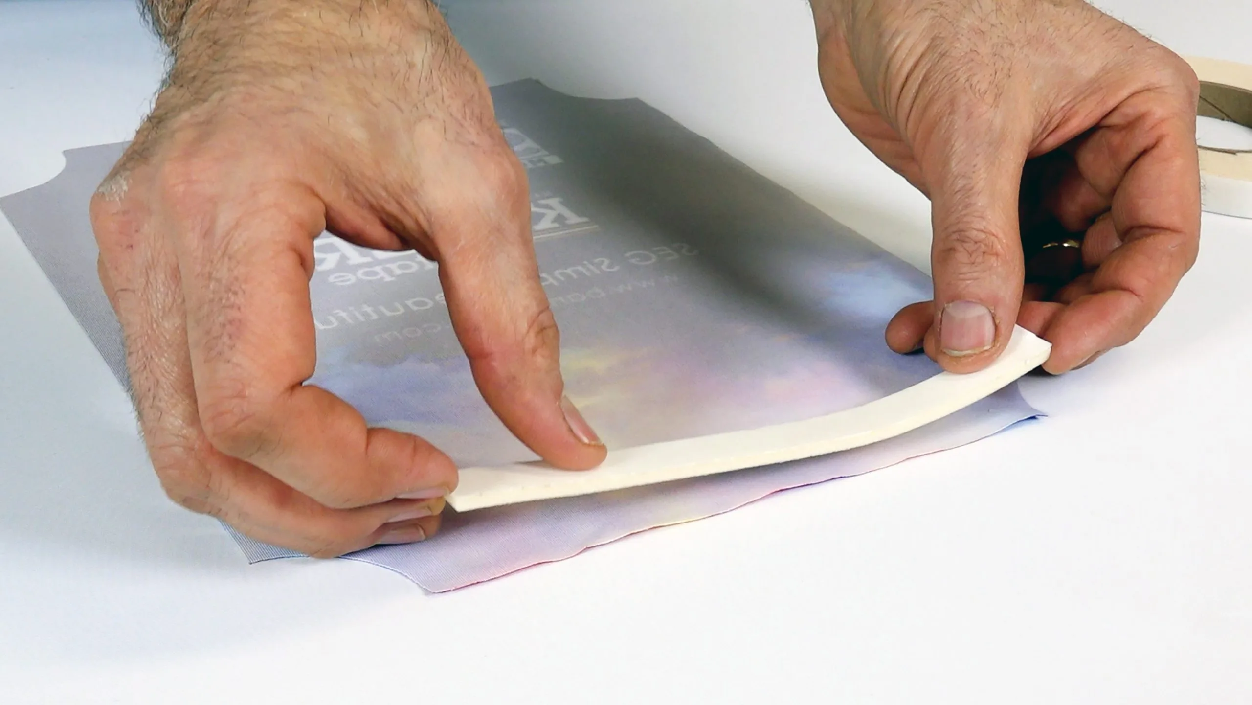 Apply KederTape LITE to the back of the printed fabric