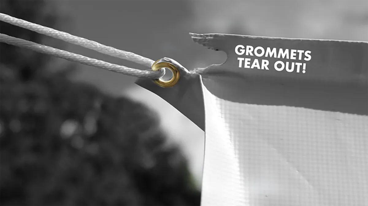 BravoTab applied over a torn banner corner for field repair